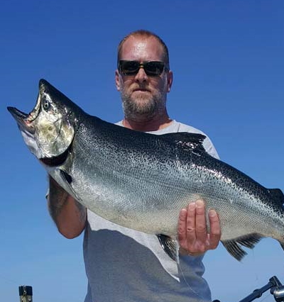 GUY-HOLDING-CHINOOK SVIAC, Fish, Advocacy, Salmon, Angling, Fishing, Halibut, Lingcod, Lobbying, Influence, Government, Chinook, Fraser, Victoria, British-Columbia, South-Vancouver-Island-Anglers-Coalition, breaking-news, updates, news-letter, news-bulletin, information, Sooke-Chinook-Enhancement-Initiative, Hatchery, Sea-Pen, SSSC-DerBY
